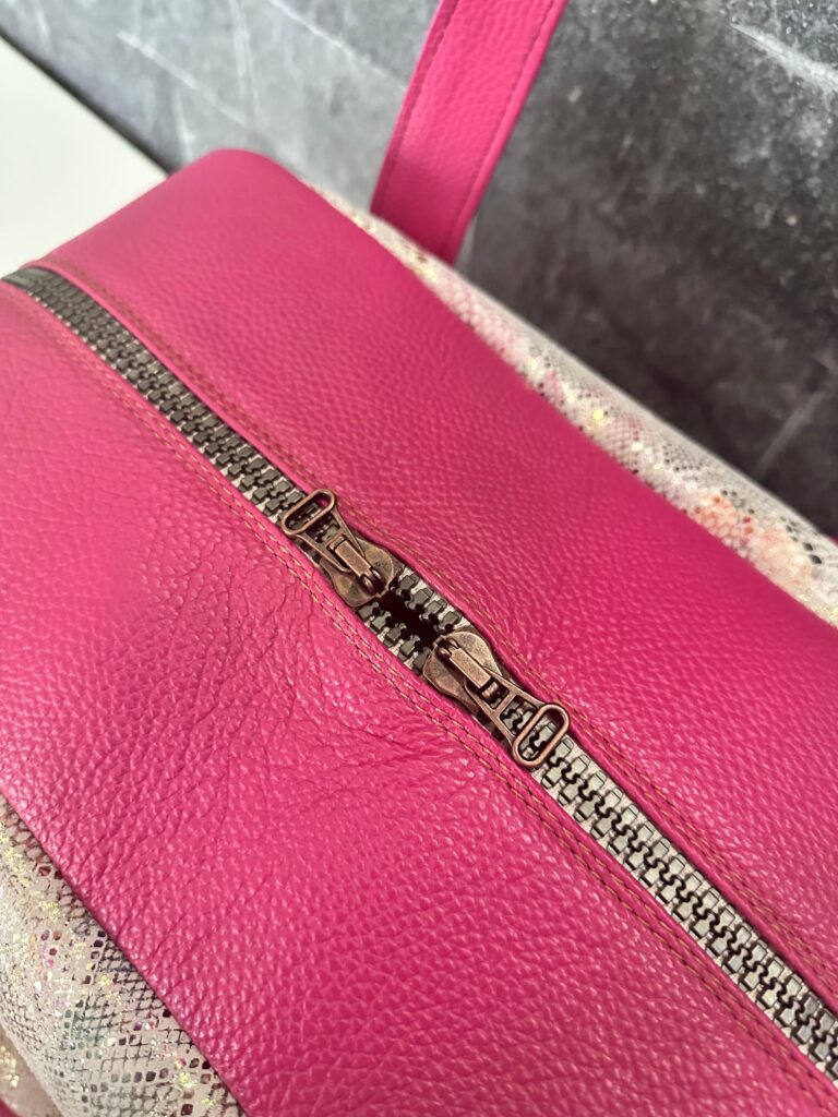 Small Kožená cestovná taška – ružová | Nomad Line